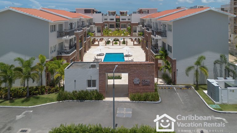 Coral Village 2 | Charming 1BR with Pool