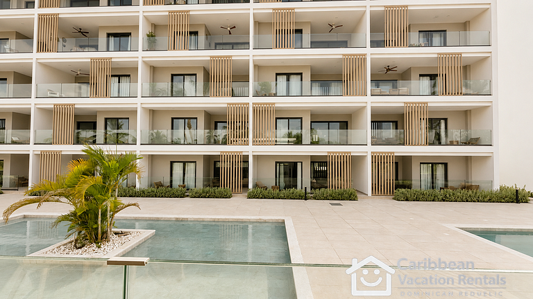 Born | 2BR ground floor with direct pool access