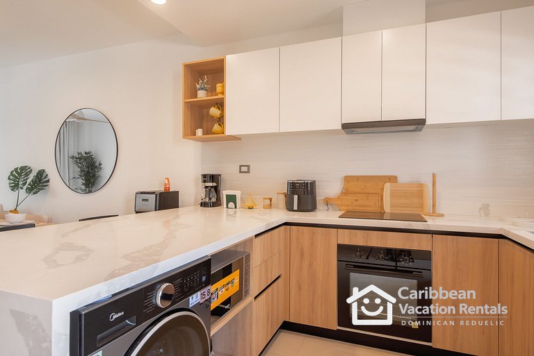 Born | Modern 2BR with Pools and Gym
